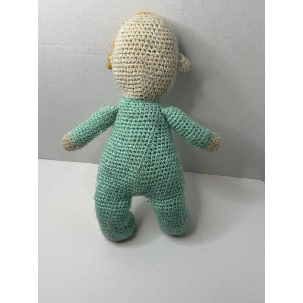 crochet doll of JJ from the children's‎ cartoon Cocomelon.